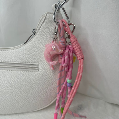 🌸 Grigri de sac – Dauphin rose Aloha 🐬✨