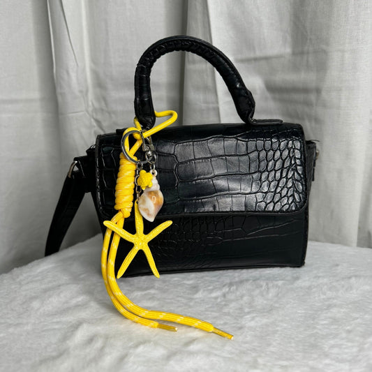 🌺 grigri étoile mer jaune ⭐️